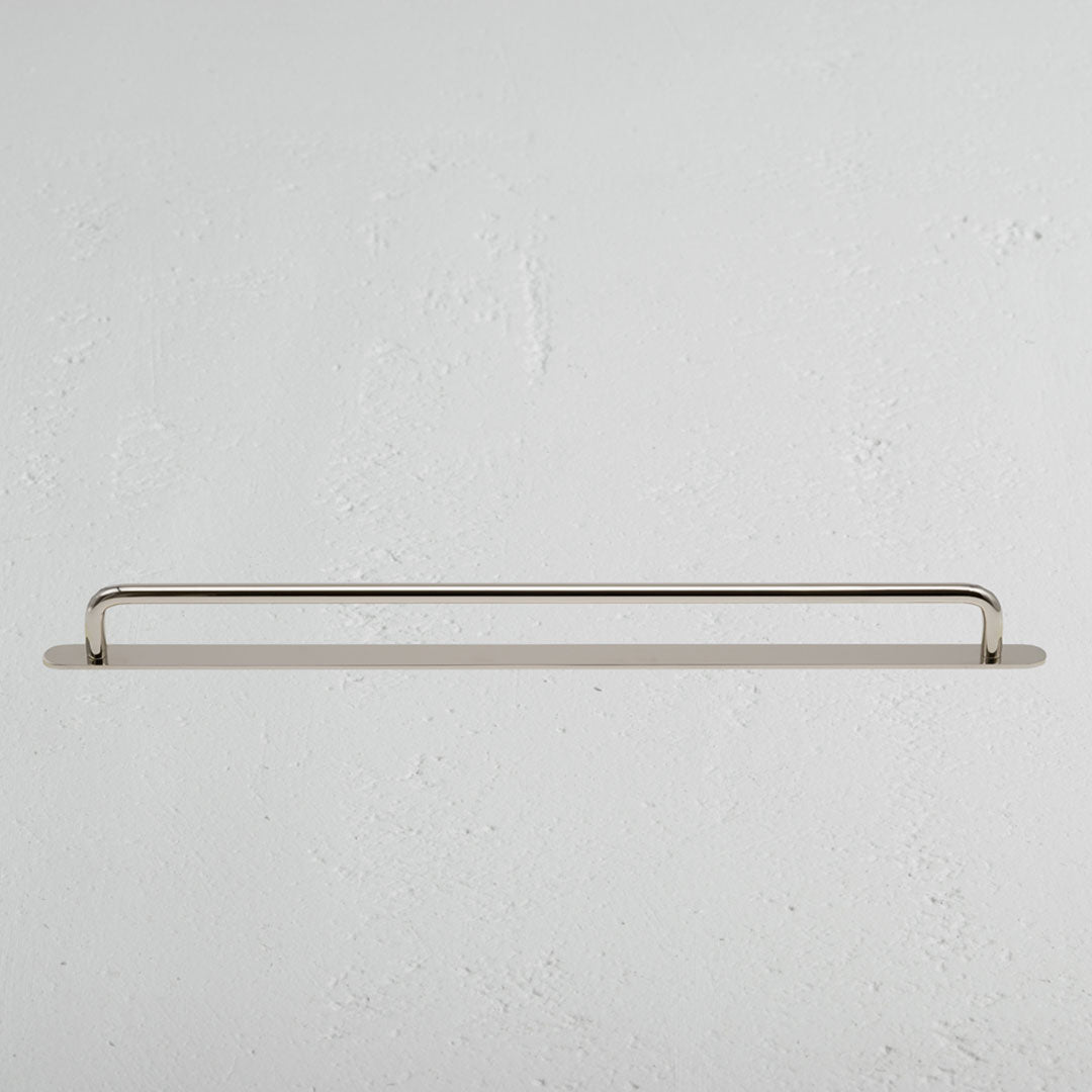 Large Kilburn furniture handle in polished nickel finish, shown mounted horizontally on a white surface.