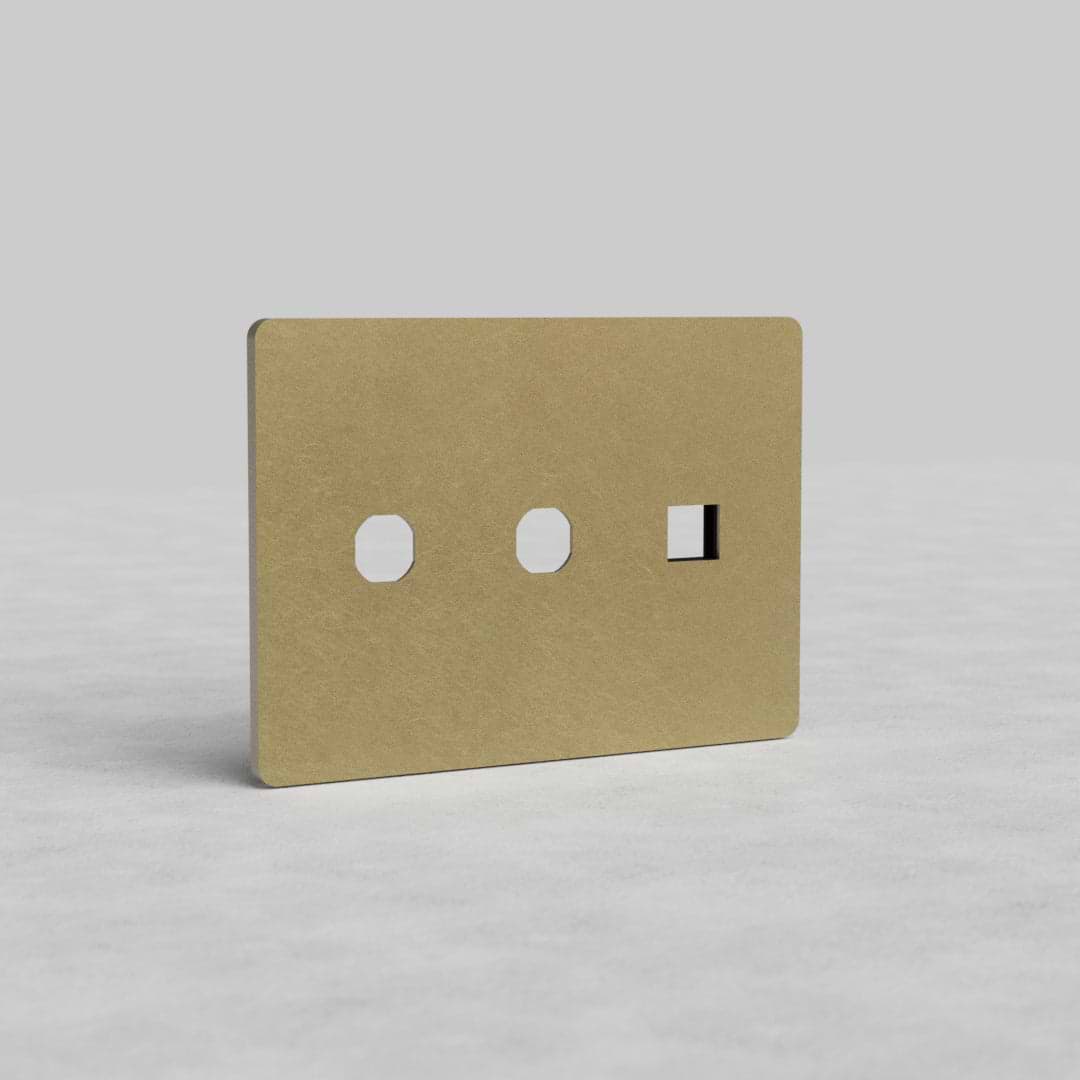 Antique brass 3-gang 2x switch and keystone plate Grove US, rectangular faceplate with cut-outs.