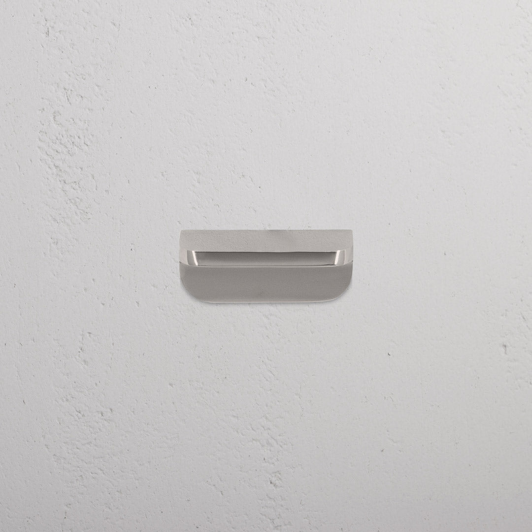 Polished nickel Oxford Furniture Handle Extra Small with a simple, modern design against a white background.