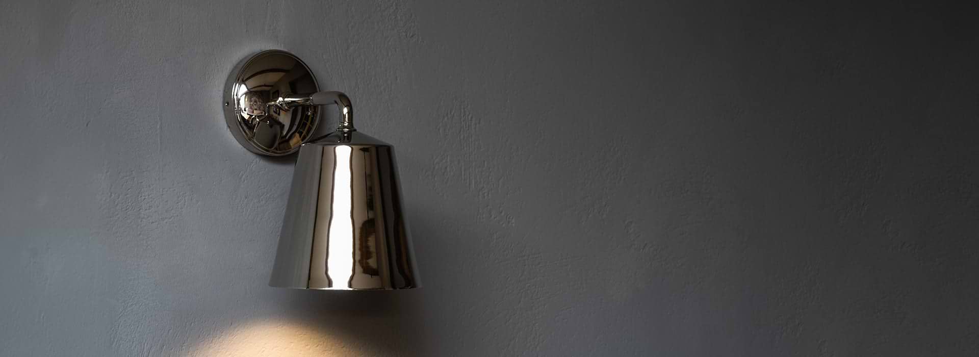 Polished Nickel wall light with fluted glass by Corston