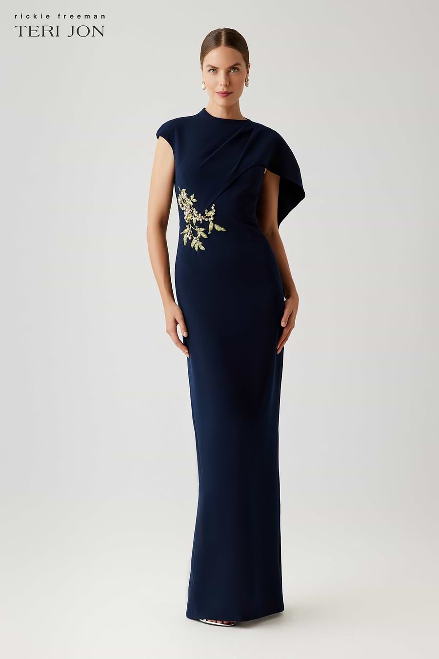 capelet formal dress Long R&M Richards 1560 A reinforced design that offers a secure and anchored fit while highlighting the intricate lace work Jovani 39957 Fitted Long Beaded