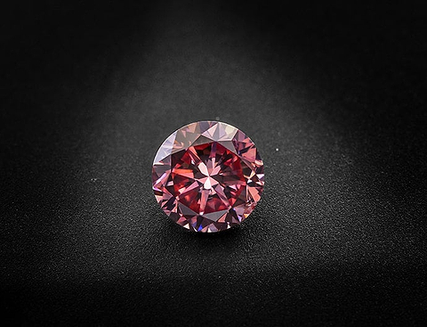 LEIBISH A 0.70 carat, Fancy Vivid Pink Diamond, Round Shape, SI1 Clarity, GIA