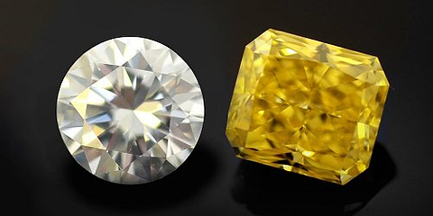 LEIBISH round brilliant white diamond and a yellow radiant shaped stone