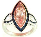 The 3.00 ct Fancy Pink Marquise Set in a Blue Sapphire Ring