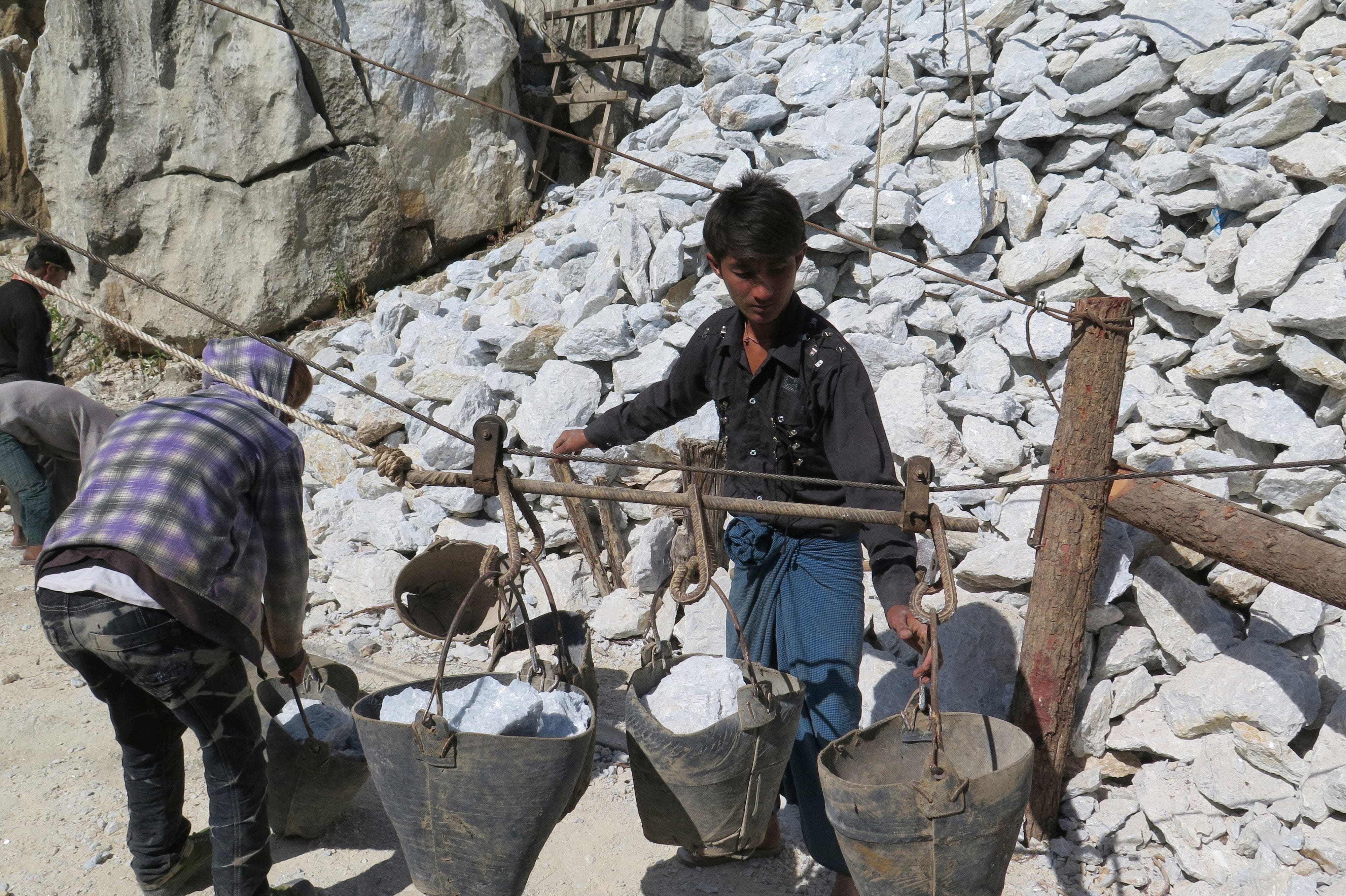 Miners in the Kadoke-tat mine during hard and dangerous labor