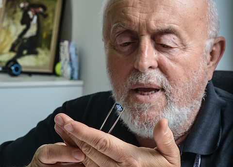 Leibish is in awe of the beauty of his 1.03 carat Fancy Deep Gray Violet diamond