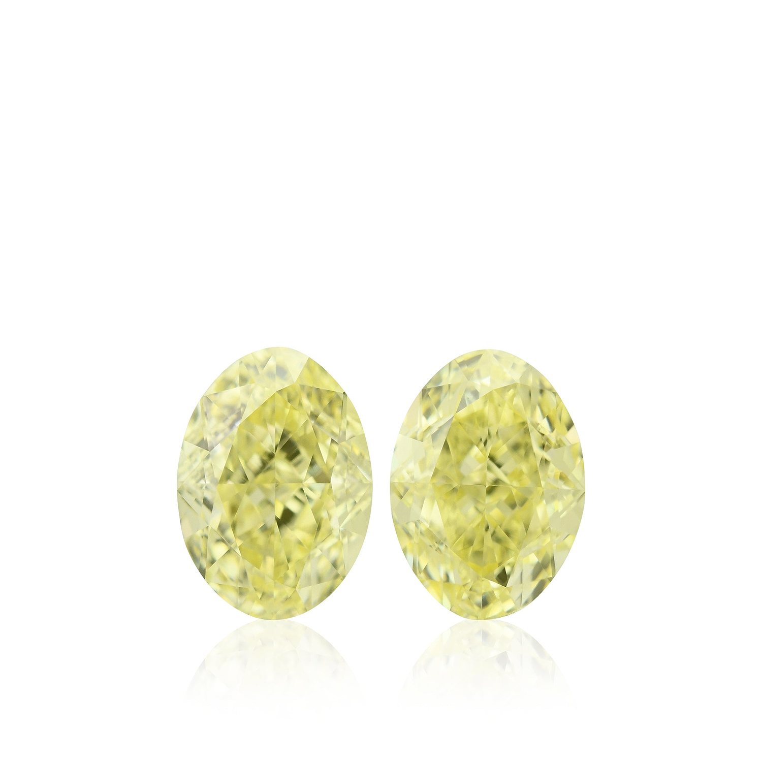 1.11 Carat Fancy Yellow Oval Diamonds VVS2