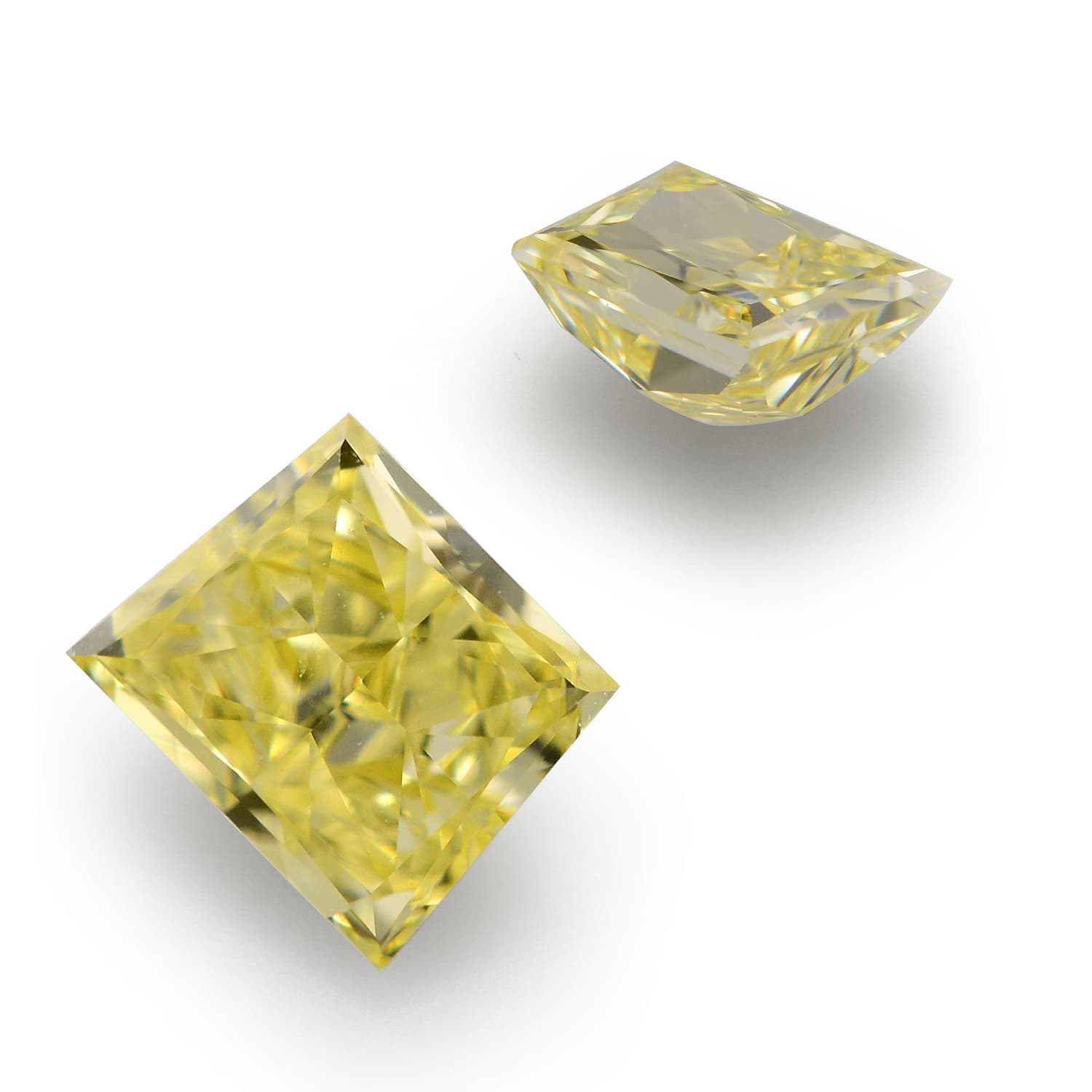 0.58 Carat Fancy Intense Yellow Taper Diamonds (VS)