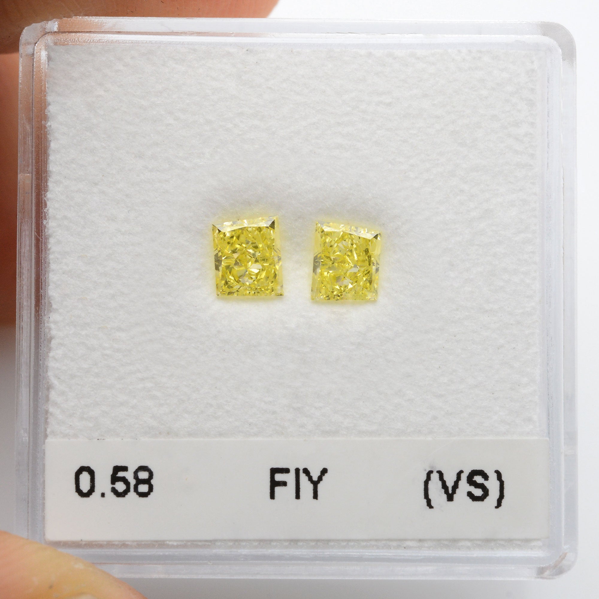 0.58 Carat Fancy Intense Yellow Taper Diamonds (VS)