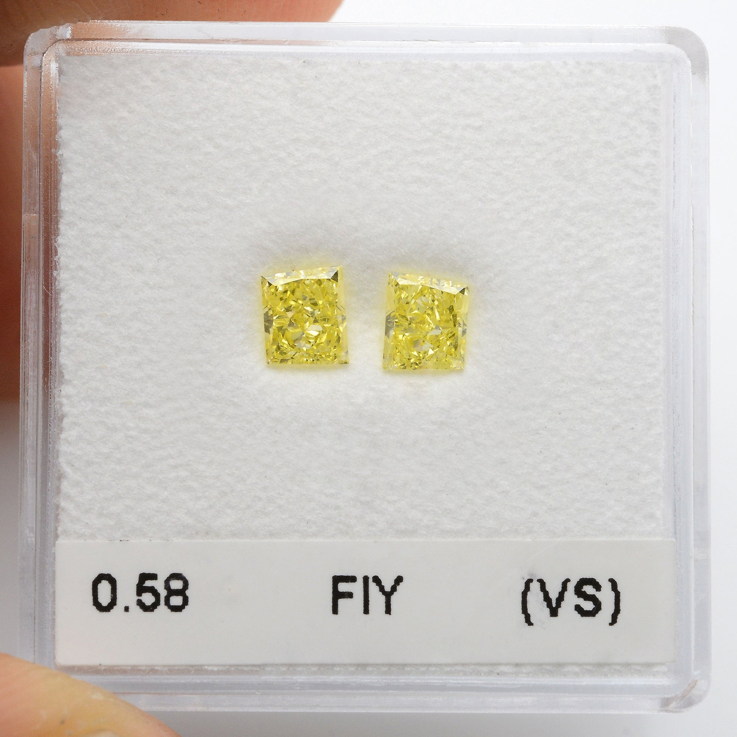 0.58 Carat Fancy Intense Yellow Taper Diamonds (VS)