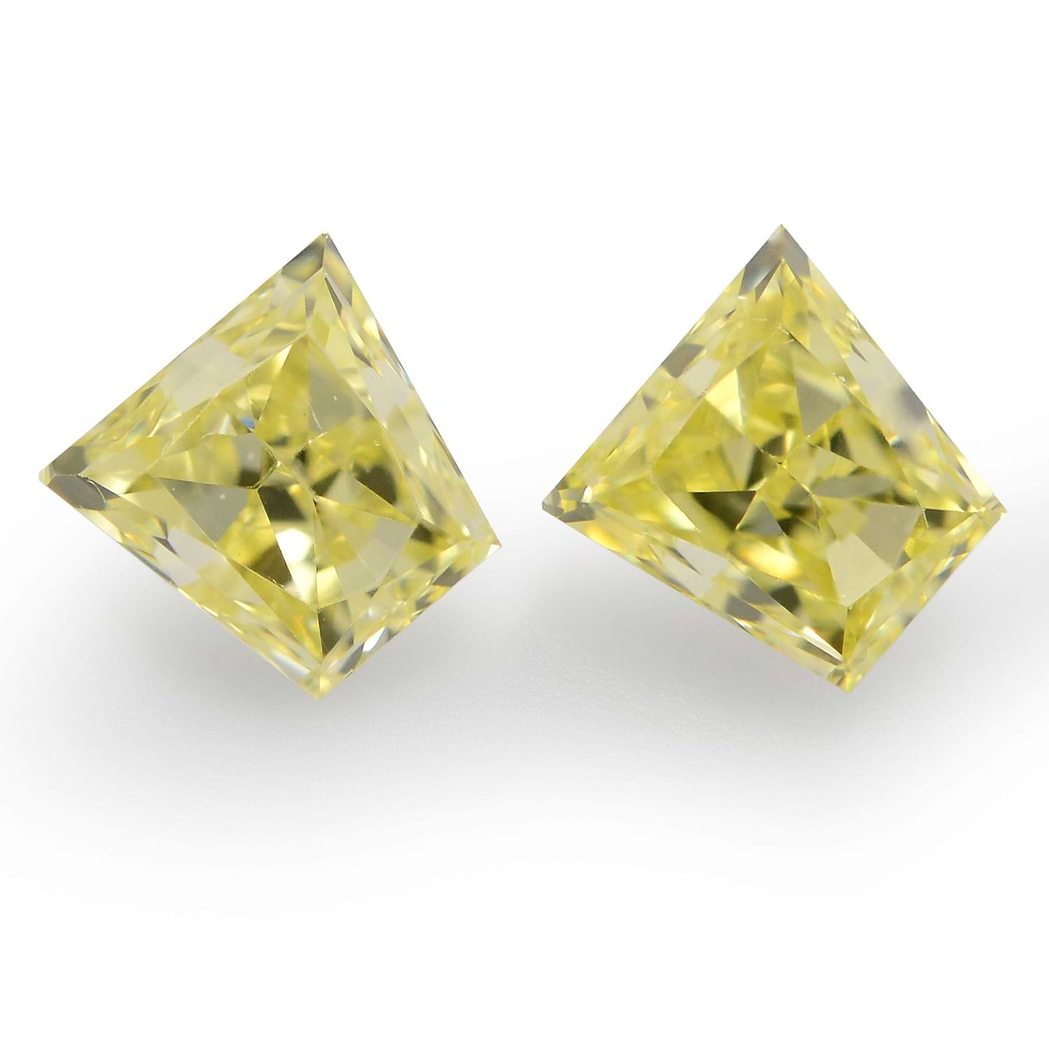 0.66 Carat Fancy Intense Yellow Trapezoid Diamonds (SI1)