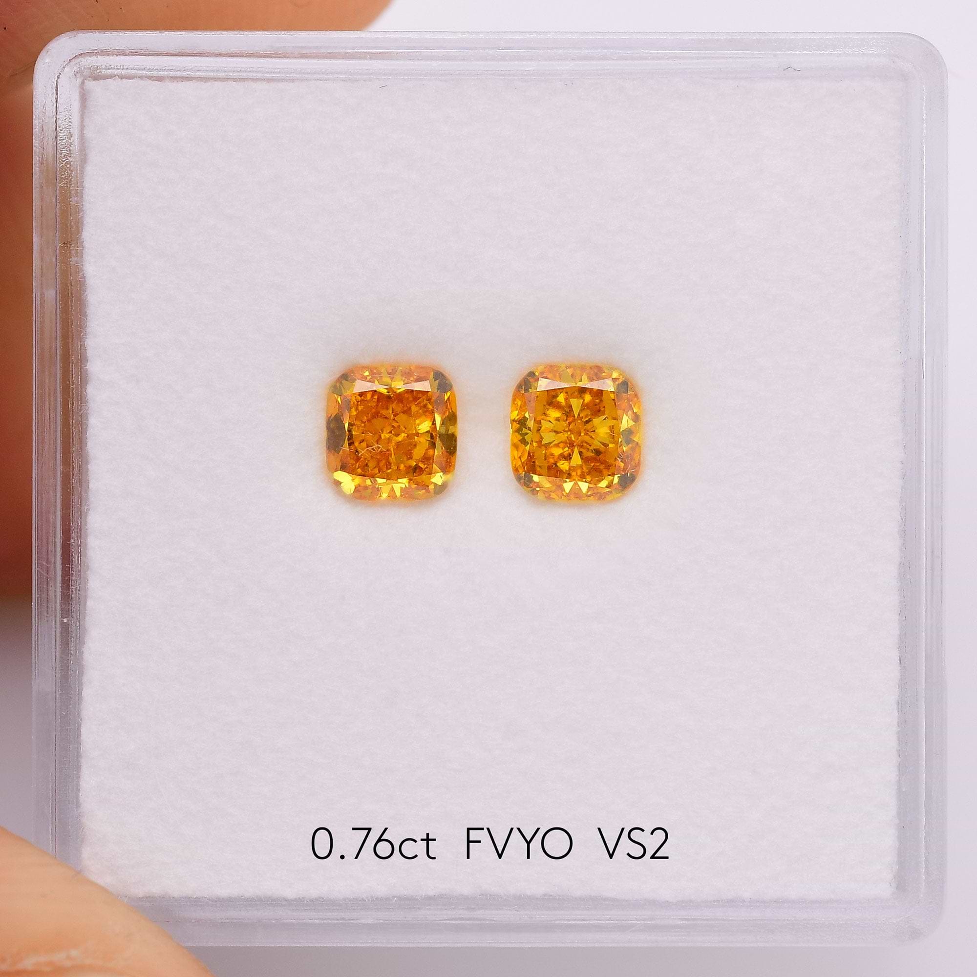 0.76 Carat Fancy Vivid Yellow Orange Cushion Diamonds VS2 0.76 Carat Fancy Vivid Yellow Orange Cushion Diamonds VS2