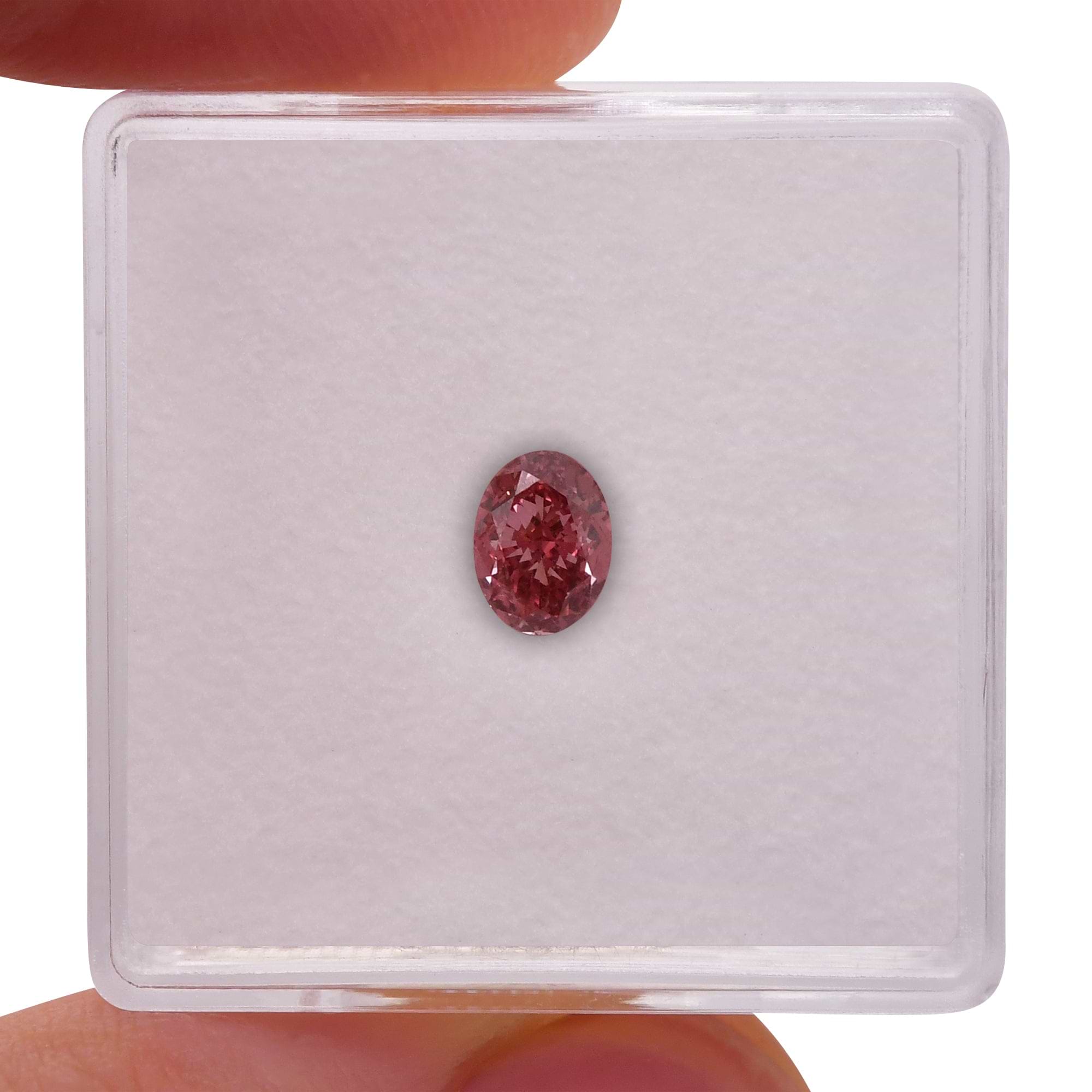 0.51 Carat Fancy Deep Orangy Pink Oval Diamond SI1 GIA