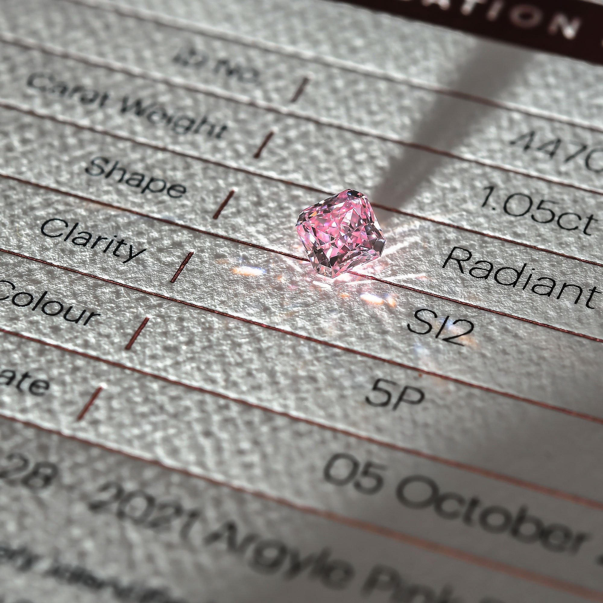 0.23 Carat Fancy Intense Purplish Pink Round Brillant