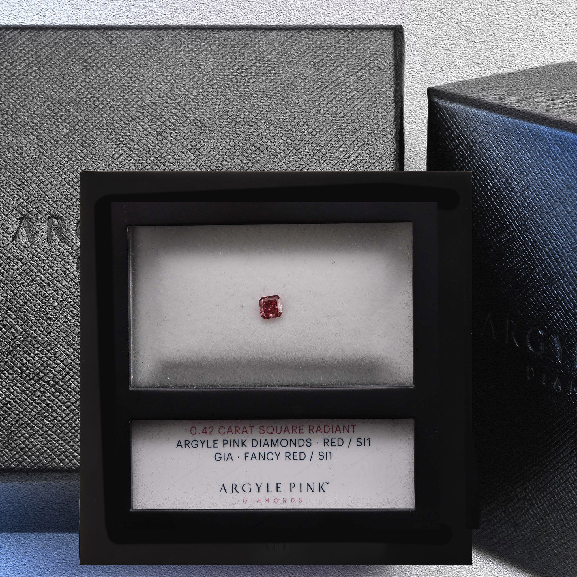 0.42 Carat Fancy Red Radiant Diamond SI1 GIA | LEIBISH