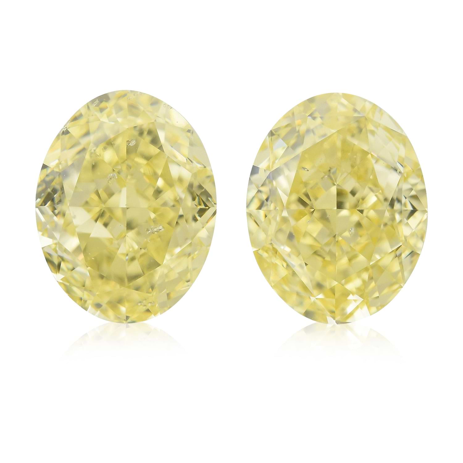 4.24 Carat Fancy Yellow Oval Diamonds SI2