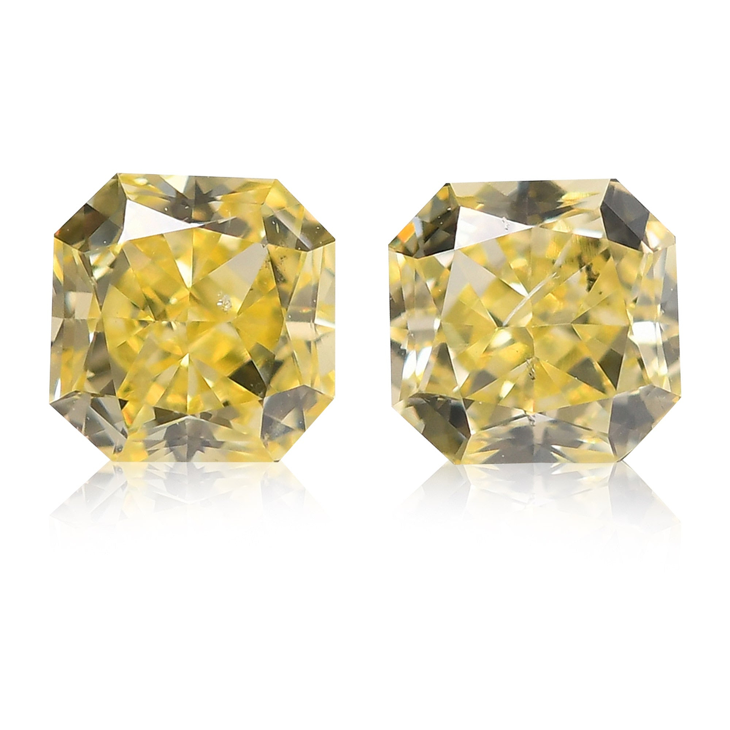 0.62 Carat Fancy Yellow Radiant Diamonds (SI1)