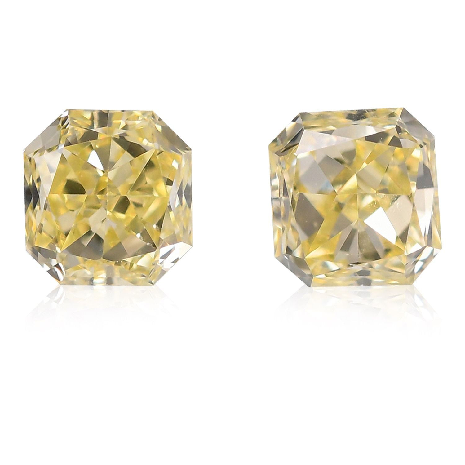 0.76 Carat Fancy Yellow Radiant Diamonds (VS2)