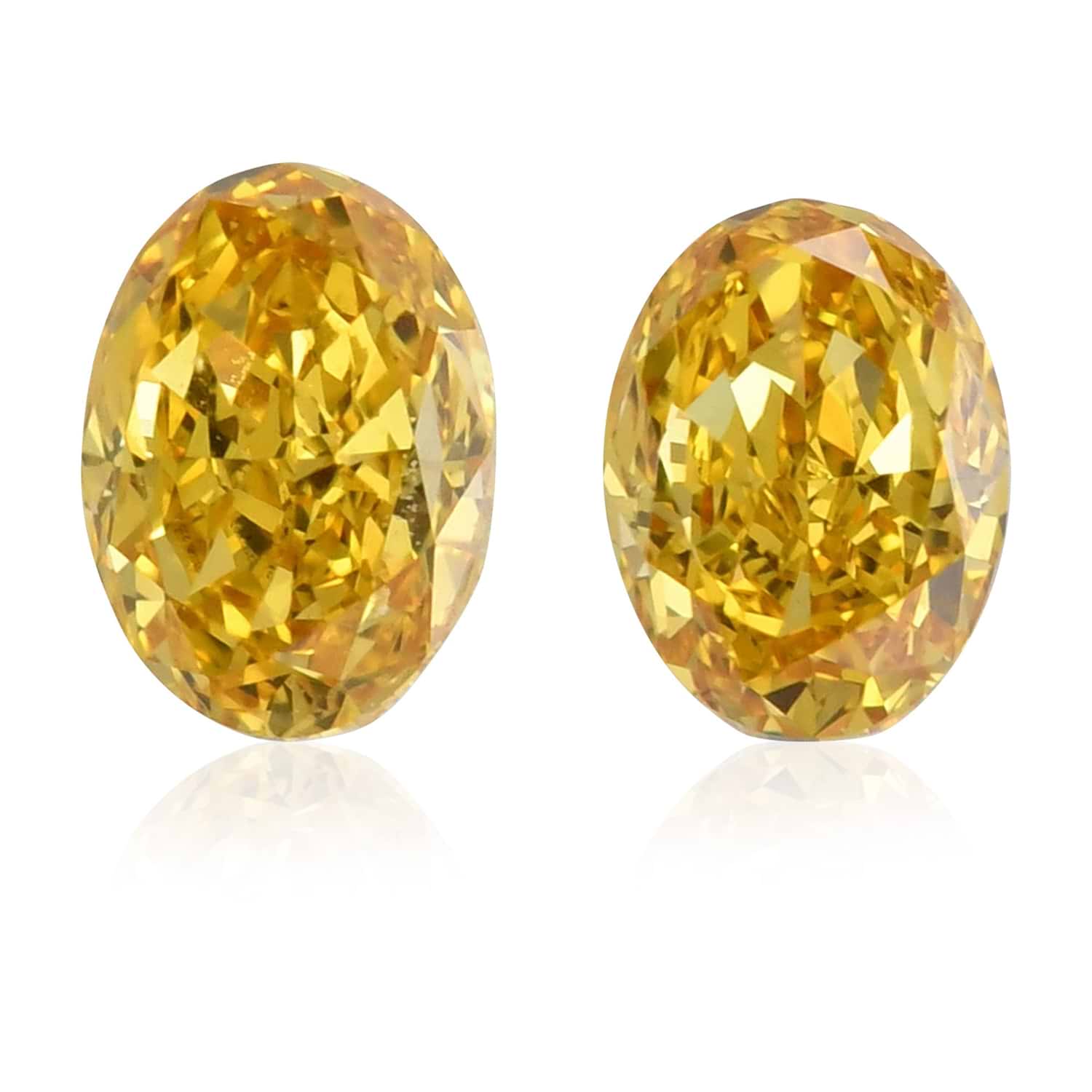 0.55 Carat Fancy Vivid Orangy Yellow Oval Diamonds VS2