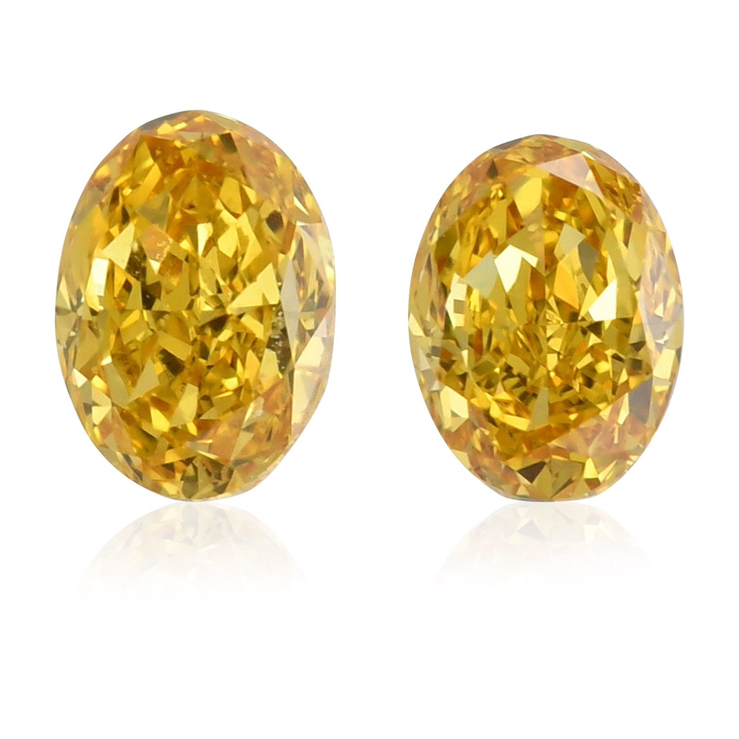 0.55 Carat Fancy Vivid Orangy Yellow Oval Diamonds VS2