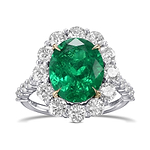 Oval Muzo Emerald and Diamond Halo Ring