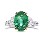 Oval Emerald and Diamond Side Stone Ring