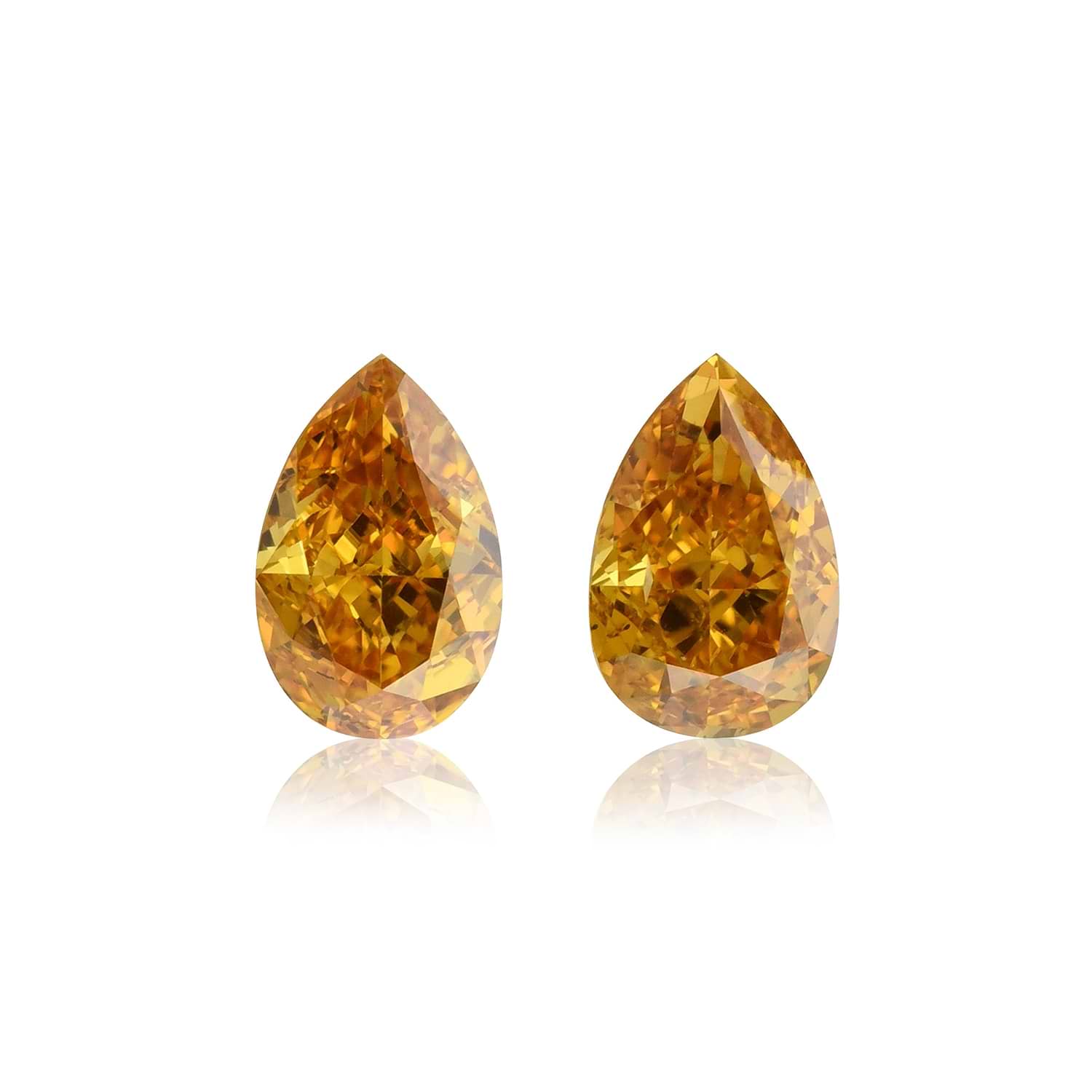 0.80 Carat Fancy Vivid Yellowish Orange Pear Diamonds SI2