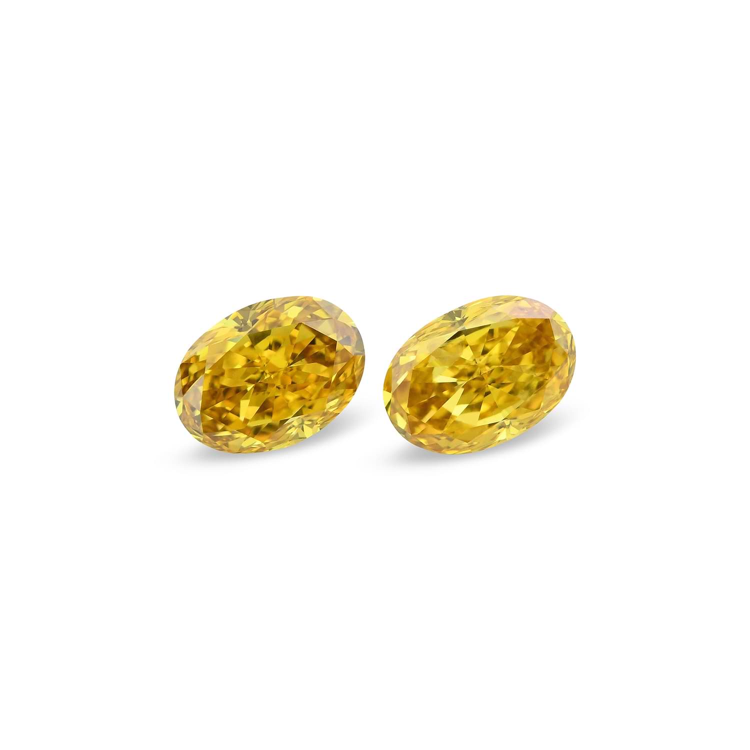 0.87 Carat Fancy Intense Orange Yellow Oval Diamonds (SI1)