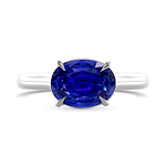 Oval Blue Sapphire and Diamond Hidden Halo Ring