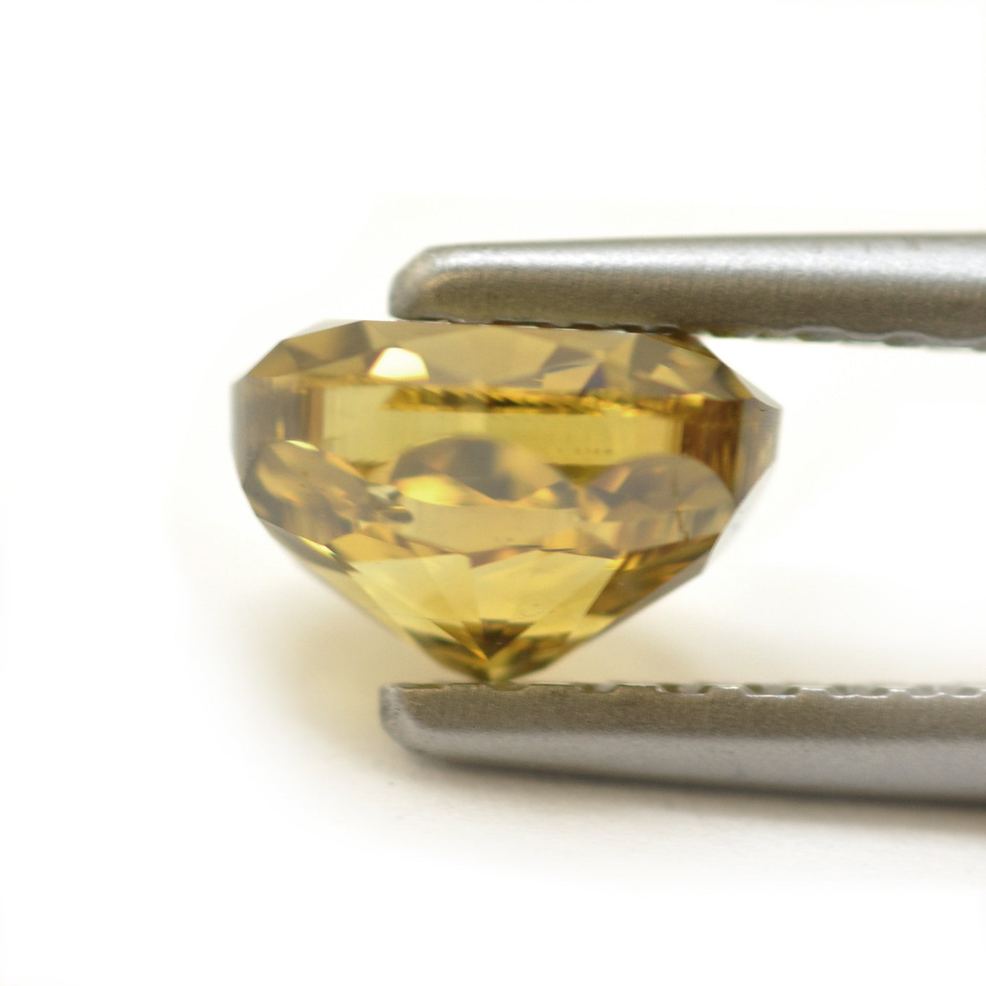 0.76 Carat Fancy Deep Brownish Greenish Yellow Oval Diamond