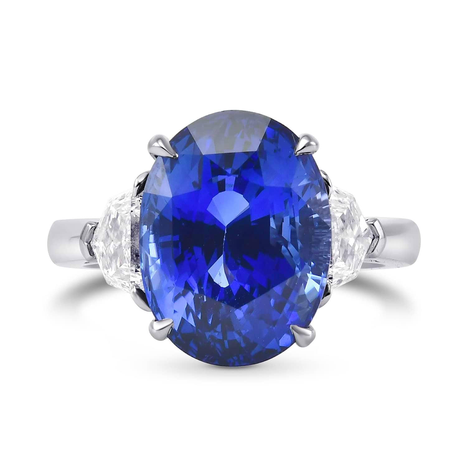 Extraordinary Oval Blue Sapphire and Diamond Three-stone Ring