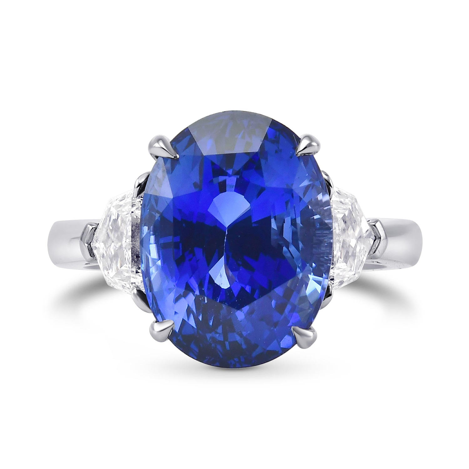 Extraordinary Oval Blue Sapphire and Diamond Three-stone Ring