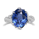 Extraordinary No Heat Oval Sapphire and Diamond Side Stone Ring