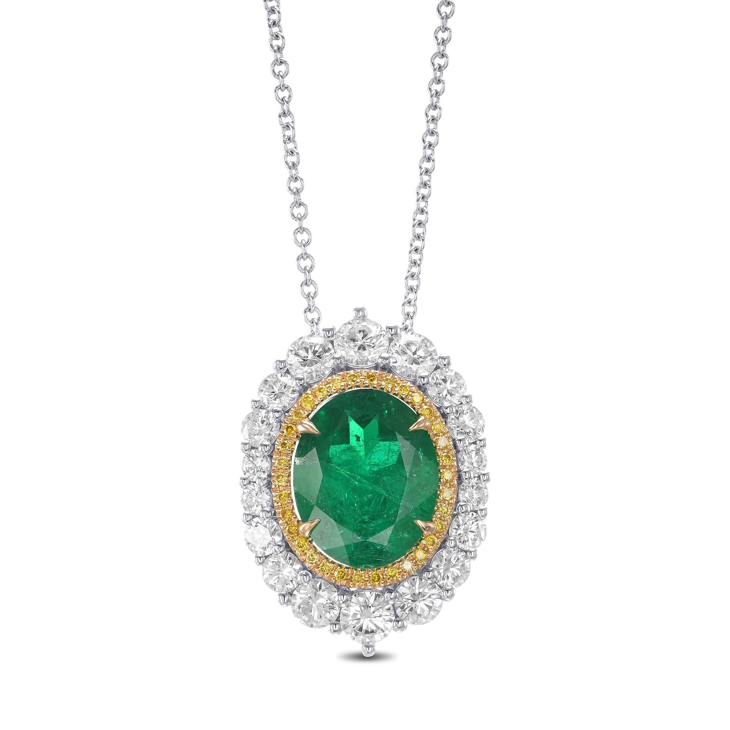 Muzo Oval Emerald and Diamond Double Halo Pendant.
