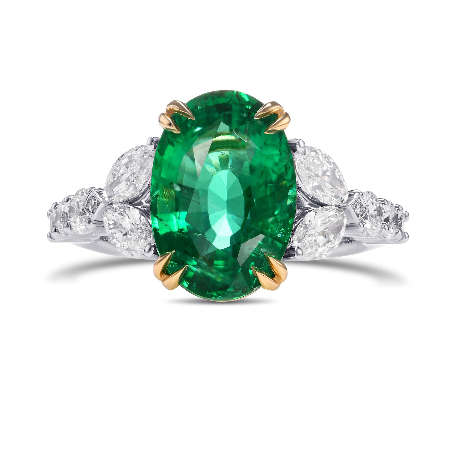 Oval Emerald and Diamond Side Stone Ring