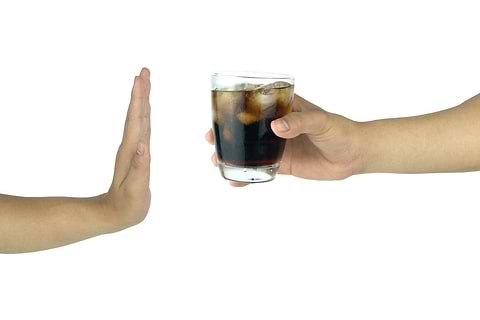 Sodas and carbonated drinks cause bloating.