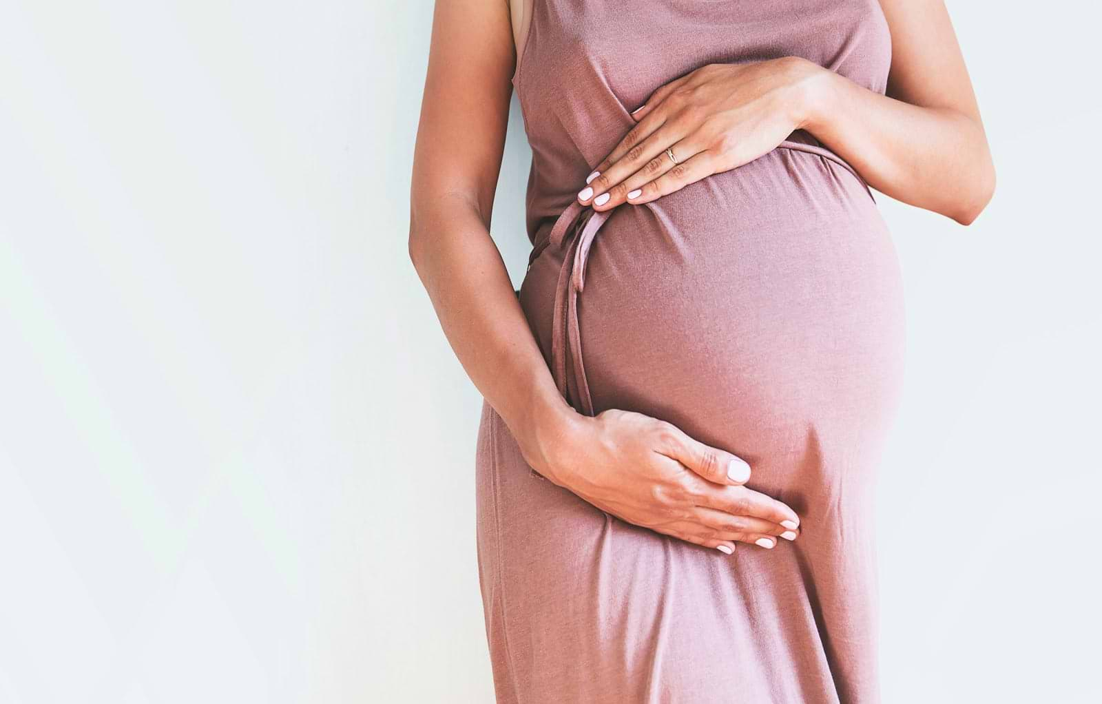 Close-up of pregnant woman's belly