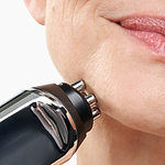 Close-up of CurrentBody RF skin tightening device being applied to jawline