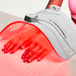 Hand treatment with CurrentBody red LED light therapy panel for anti-aging