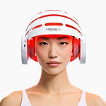 Woman using CurrentBody LED Hair Growth Helmet on her head