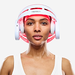 Woman using CurrentBody LED Hair Growth Helmet on her head