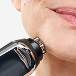 Close-up of CurrentBody RF skin tightening device being applied to jawline