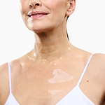 Woman wearing the LED Hydrogel Neck & Décolletage Mask