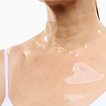 Woman wearing the LED Hydrogel Neck & Décolletage Mask