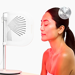 Woman using LED Panel on her face 