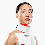 woman with neck and chest anti-ageing device looking side on