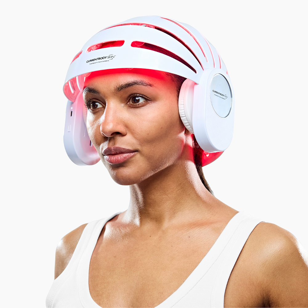 model facing side angle wearing LED hair growth helmet