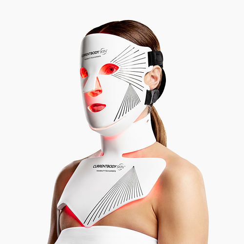 Woman using CurrentBody Red Light LED Face Mask Series 2 on her face