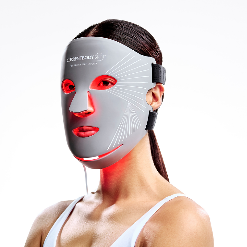 Woman using CurrentBody Multi-Light LED Face Mask