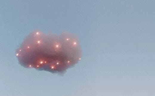 Pink cloud in a blue sky